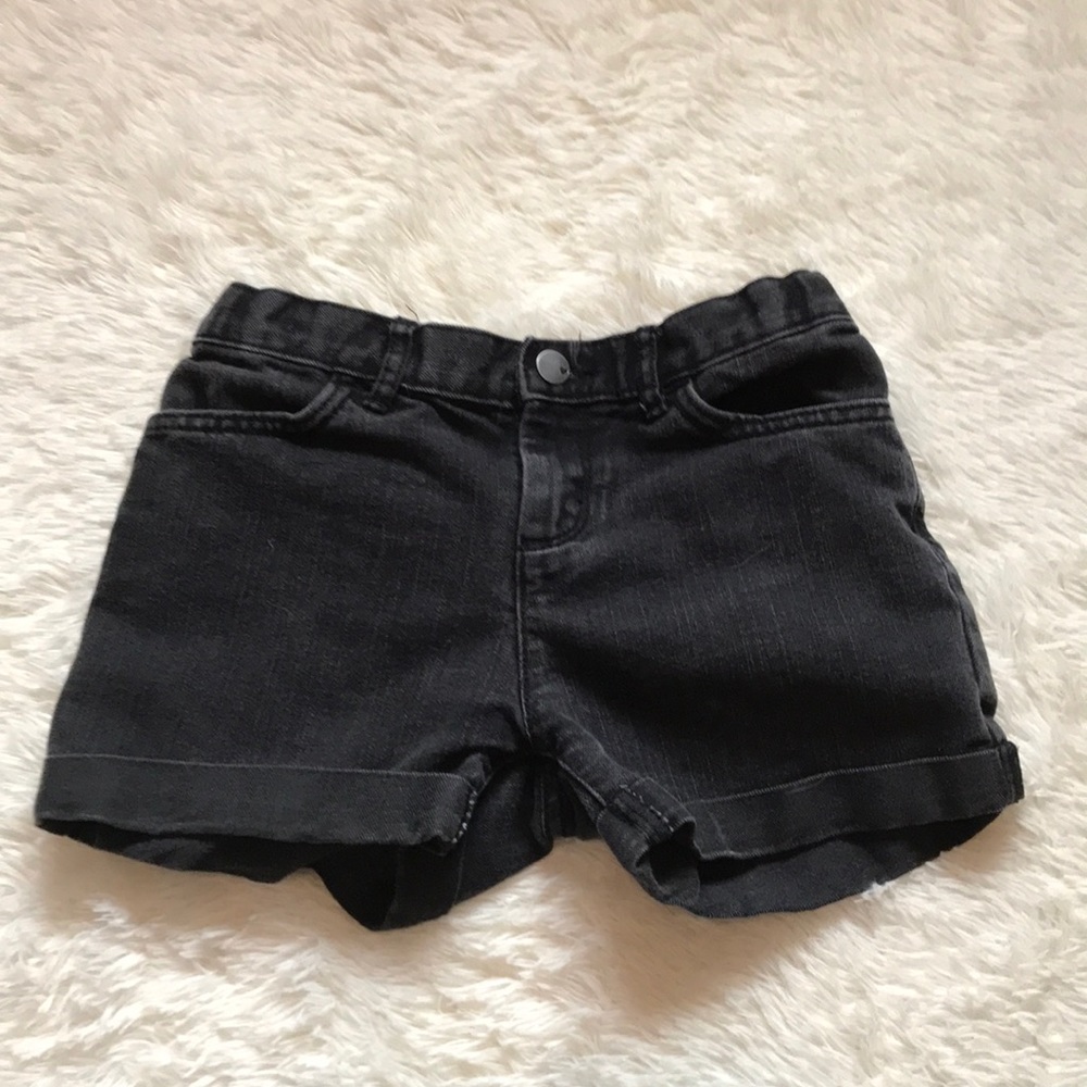 Black Jean shorts.